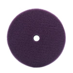 Purple cutting foam pad on a white background